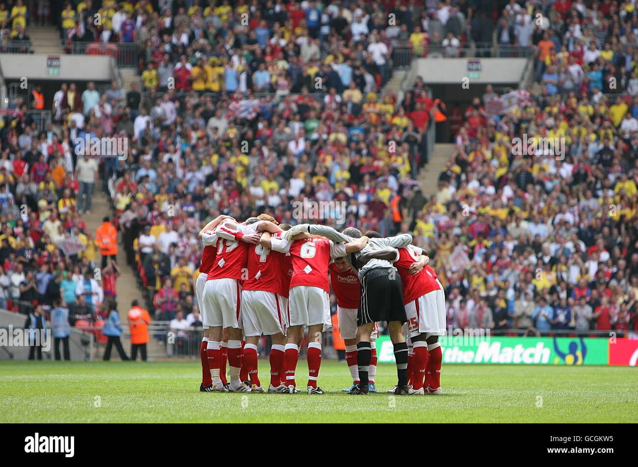 The rotherham united team huddle prior to kick off hires stock