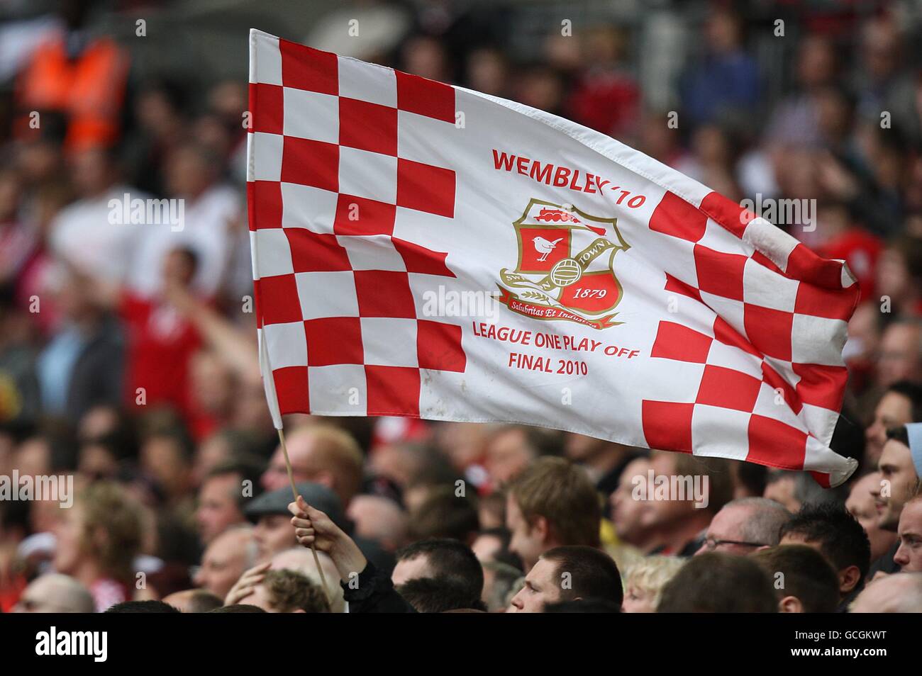 Soccer - Coca-Cola Football League One - Play Off - Final - Millwall v  Swindon Town - Wembley Stadium. A Swindon Town fan waves a flag in the  stands Stock Photo - Alamy