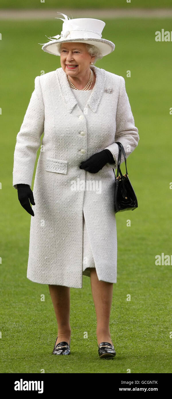 Queen Elizabeth II as she reviews the Company of Pikemen and Musketeers of the Honourable Artillery Company at Armoury House, in central London. Stock Photo