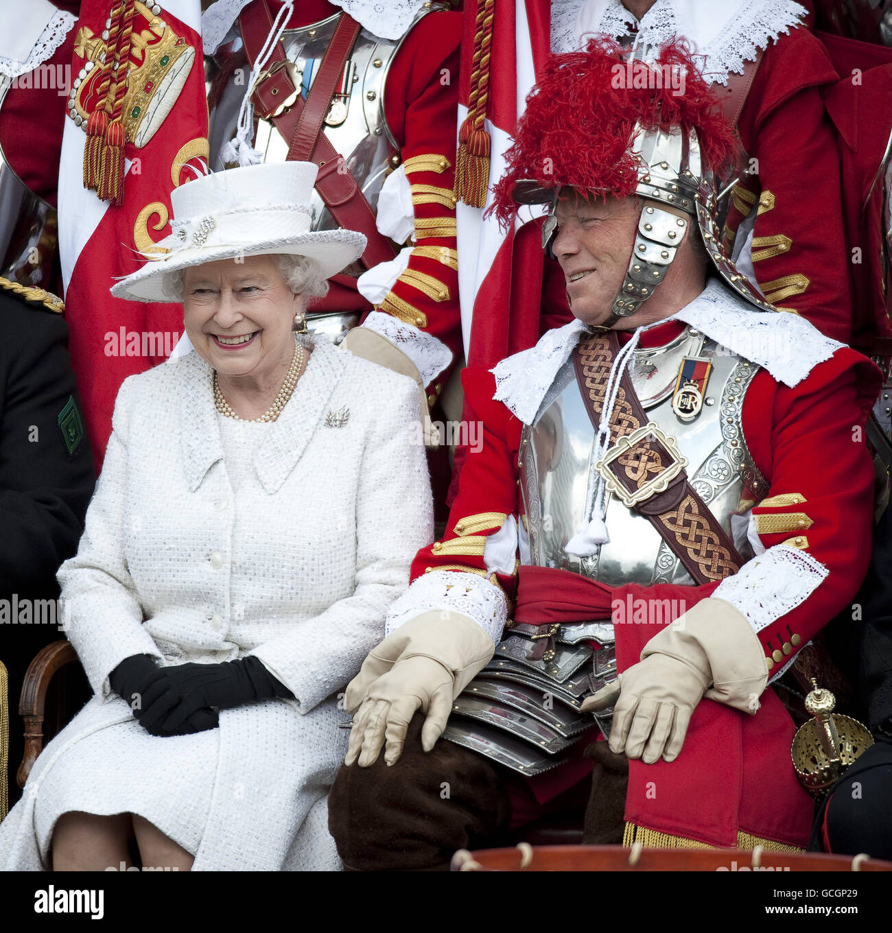 Queen Elizabeth II with Major Paul Champness, Captain of the Pikemen and Musketeers of the Honourable Artillery Company at Armoury House, in central London. Stock Photo