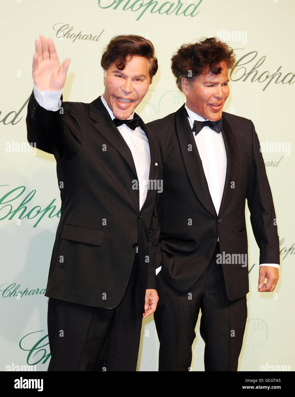 Igor and Grichka Bogdanoff, former French television star brothers, attend the Chopard 150th birthday party event during the 63rd Cannes Film Festival, France. Stock Photo