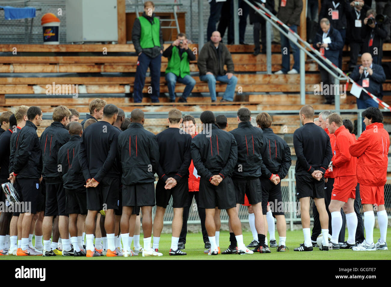England players listen to manager Fabio Capello (centre) during the training session at the ATV Arena, Irdning, Austria. Stock Photo