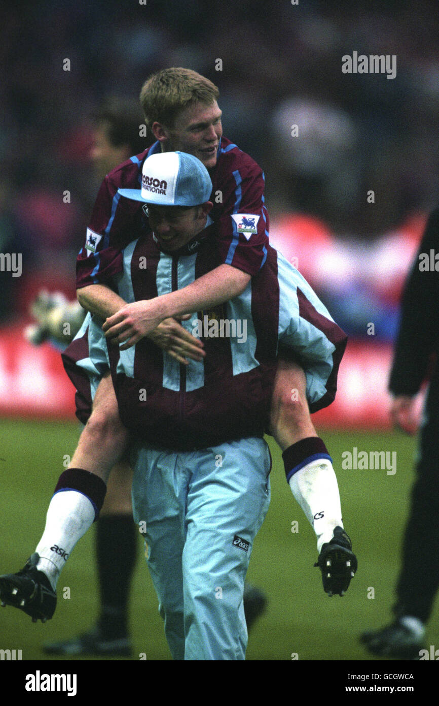 (l-r) Steve Froggatt and Graham Fenton, Aston Villa, celebrate after beating Manchester United. Stock Photo