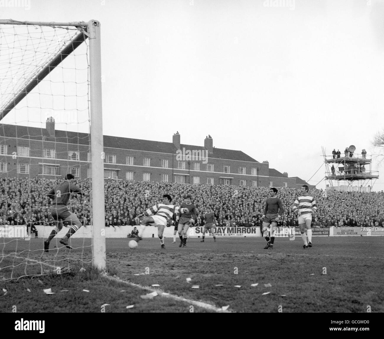 Queen's Park Rangers Ian Morgan shoots and beats Portsmouth goalkeeper John Milkins to score within two minutes. They later scored again to give them a 2-0 victory Stock Photo