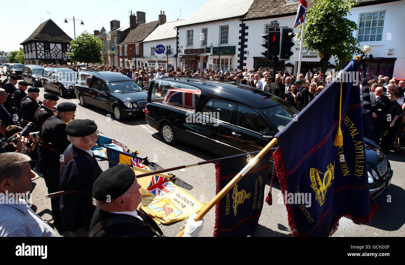 The bodies of Gunner Zak Cusack, of 4th Regiment Royal Artillery, and Corporal Stephen Curley and Marine Scott Taylor, both of 40 Commando, Royal Marines are driven through Wootton Bassett, Wiltshire, after their repatriation ceremony at RAF Lyneham. Stock Photo