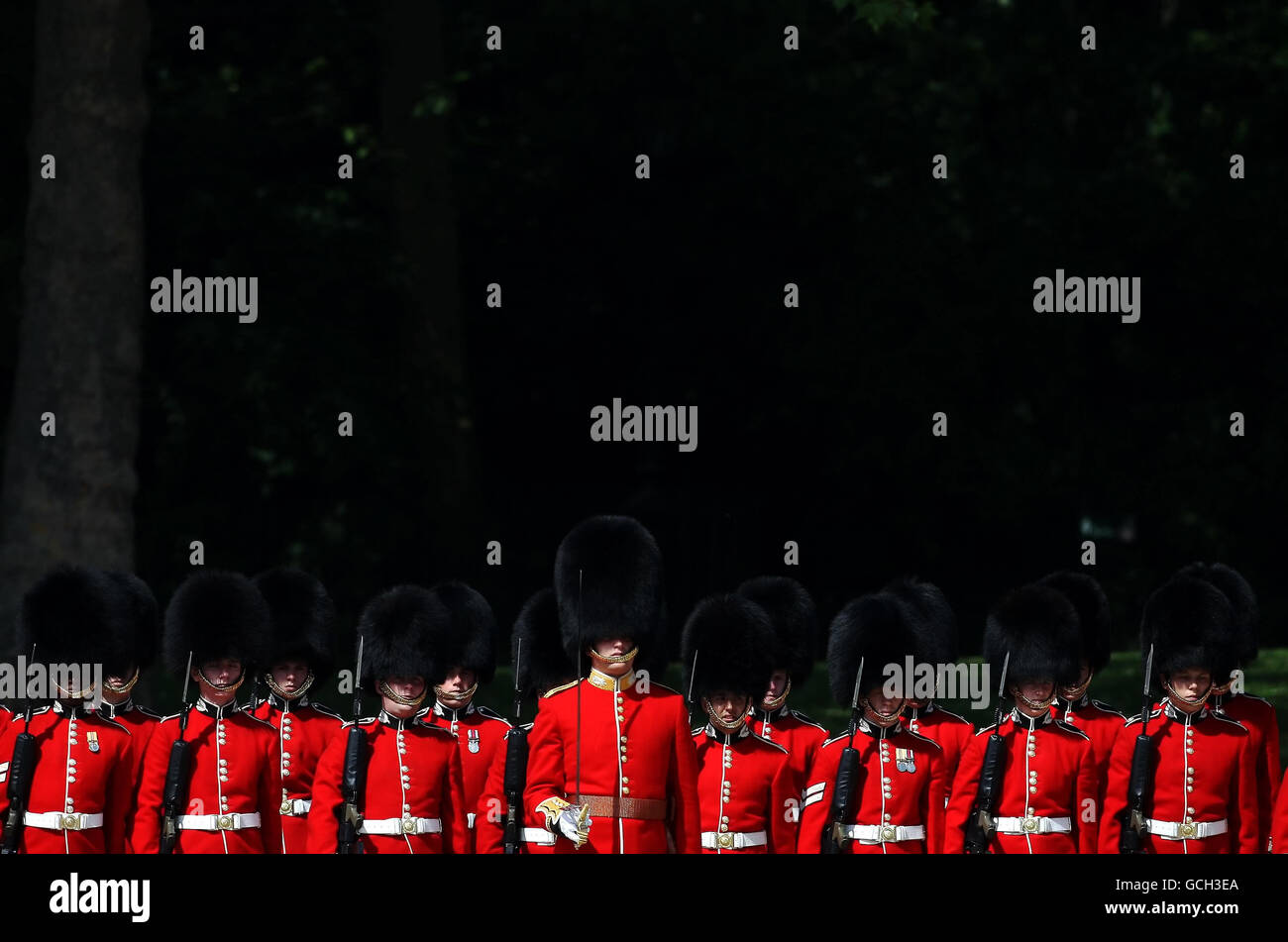 Troops from the Scots Guards stand during the Colonel's Review, on Horse Guards Parade, Westminster, London, ahead of the the Trooping of the Colour parade next weekend. Stock Photo