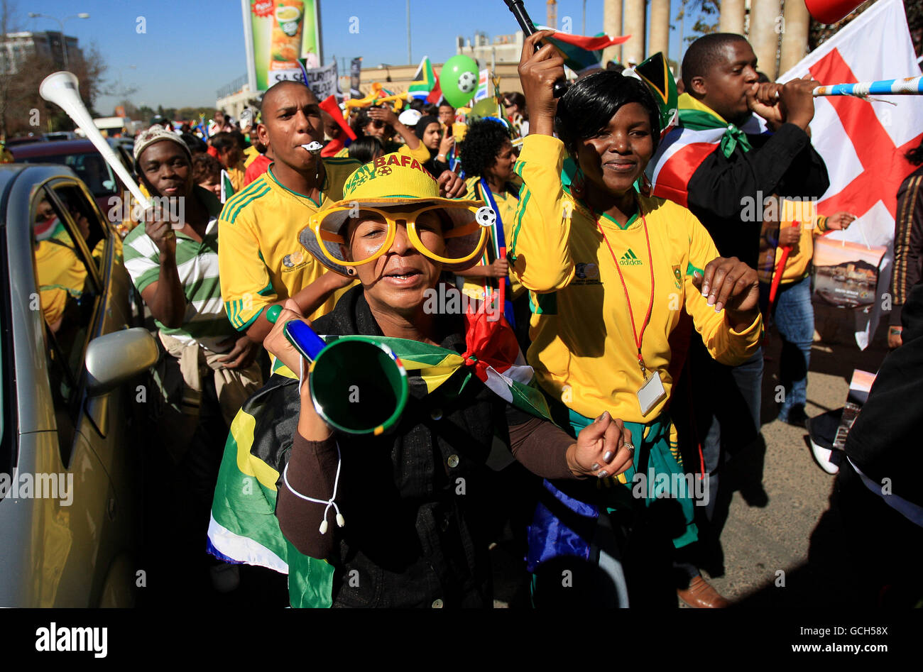 South Africa fans enjoy a carnival atmosphere as they take part in a parade through the streets of Johannesburg Stock Photo