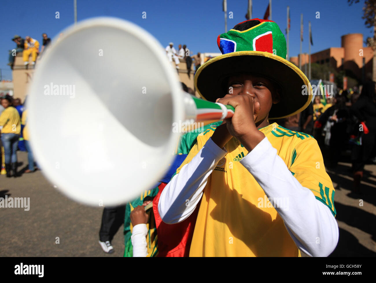South Africa fans enjoy a carnival atmosphere as they take part in a parade through the streets of Johannesburg Stock Photo