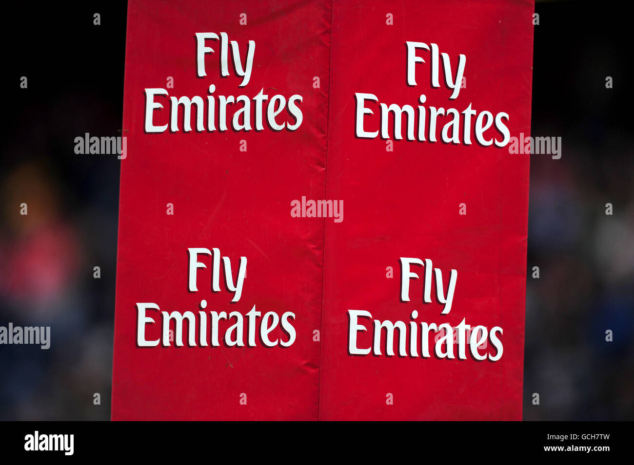 General view of Fly Emirates logo on a post protector Stock Photo