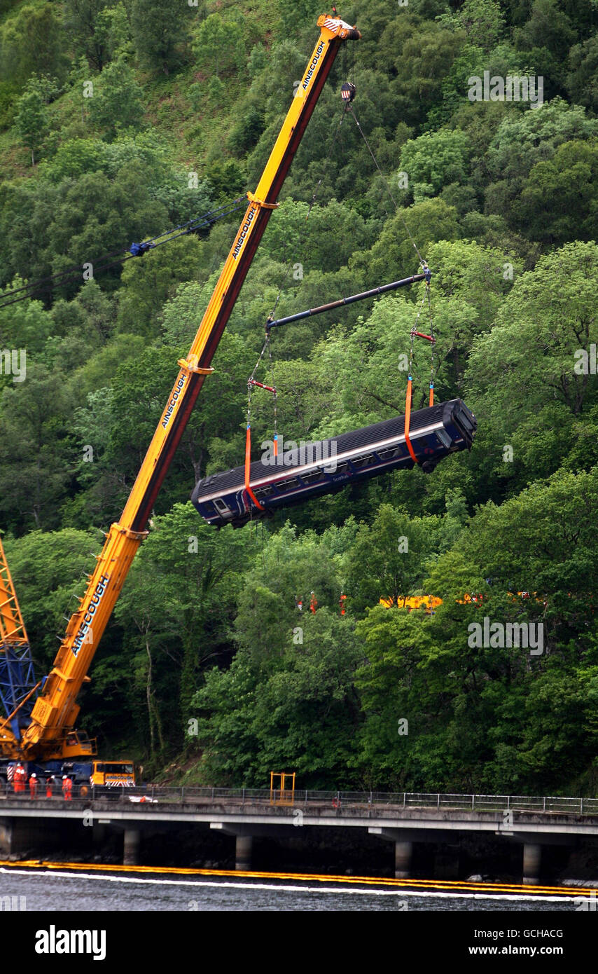 A carriage from the Scotrail train being removed from the banking near Cruachan Power station following the derailment on Monday night. Stock Photo