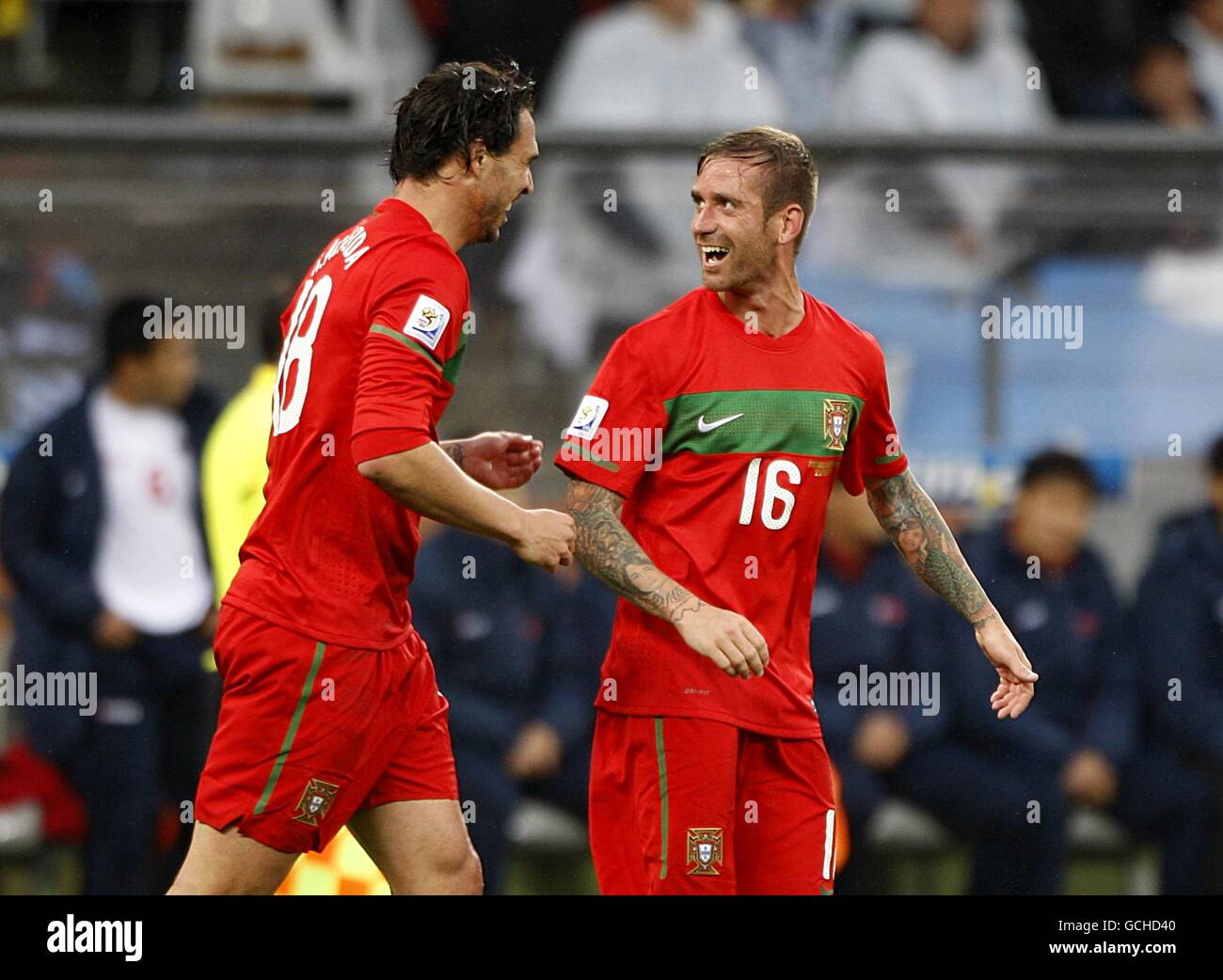Portugal's Miguel Hugo Almeida celebrates scoring his sides third goal with fellow goalscorer Jose Raul Meireles (right) Stock Photo