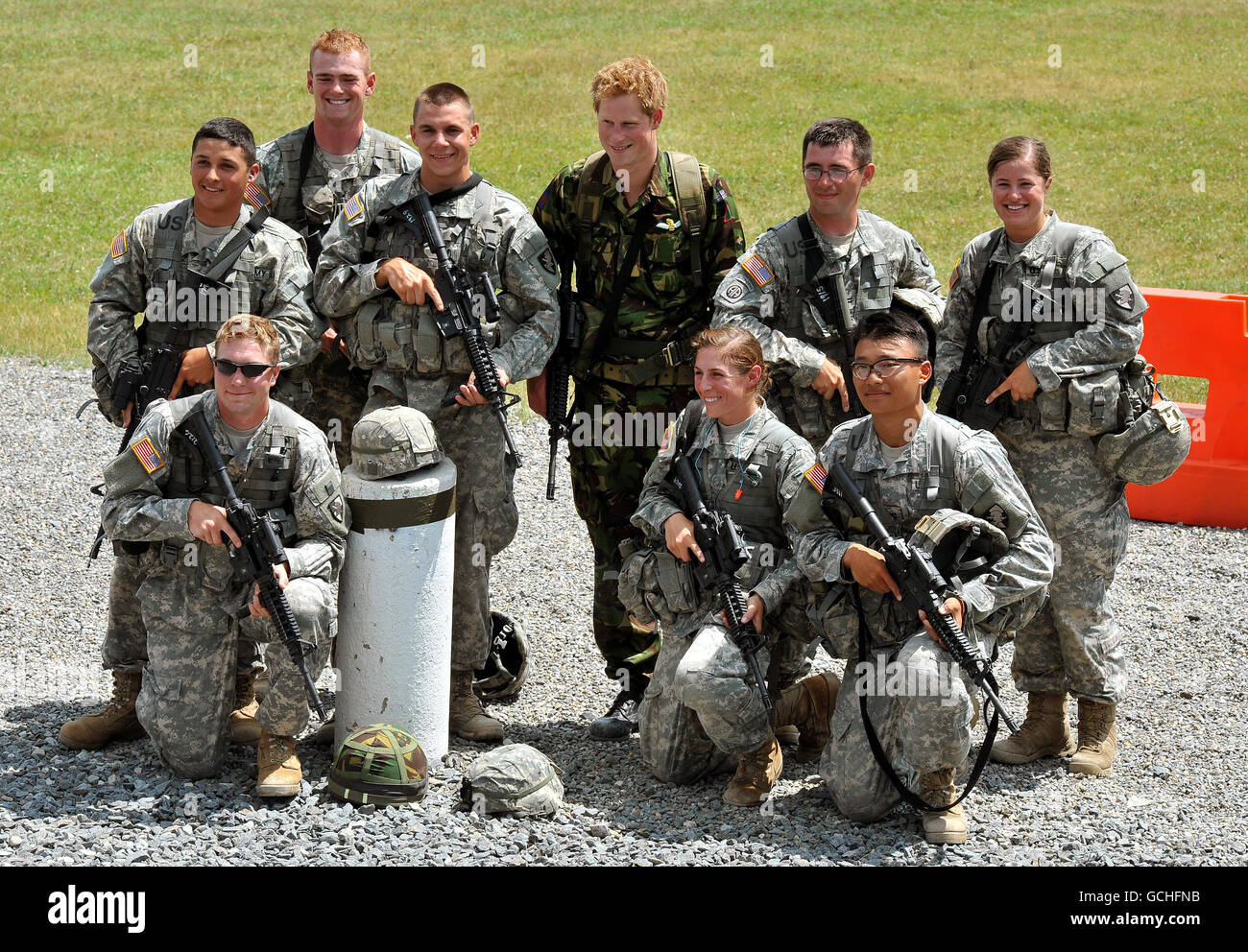 Prince Harry (back row, centre) poses with US Army Officer Cadets after taking part in a live firing exercise at the Fort Buckner shooting ranges at West Point Military Academy in New York state, USA. Stock Photo