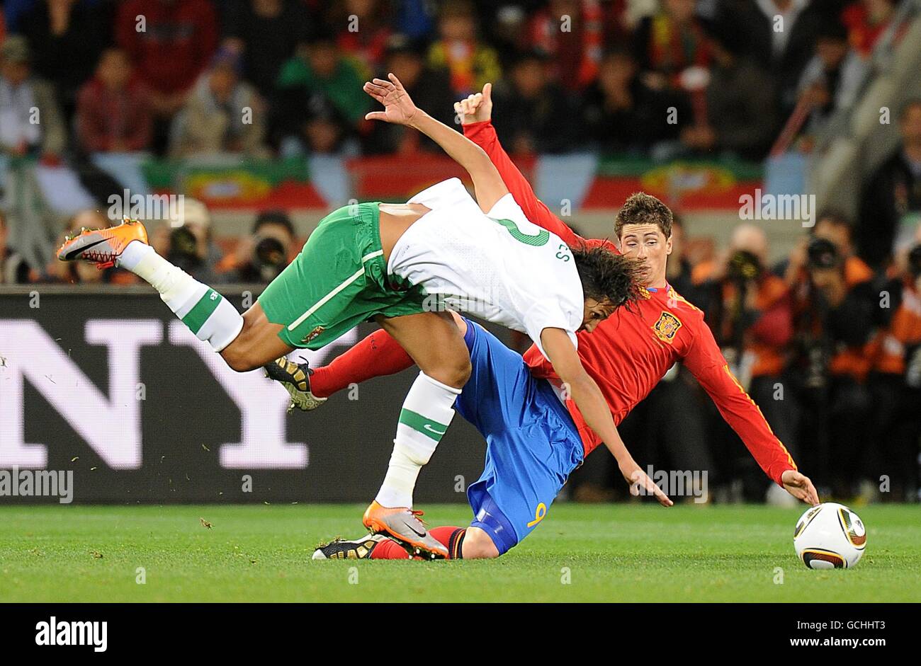 Portugal's Eduardo Bruno Alves (left) and Spain's Fernando Torres battle for the ball Stock Photo