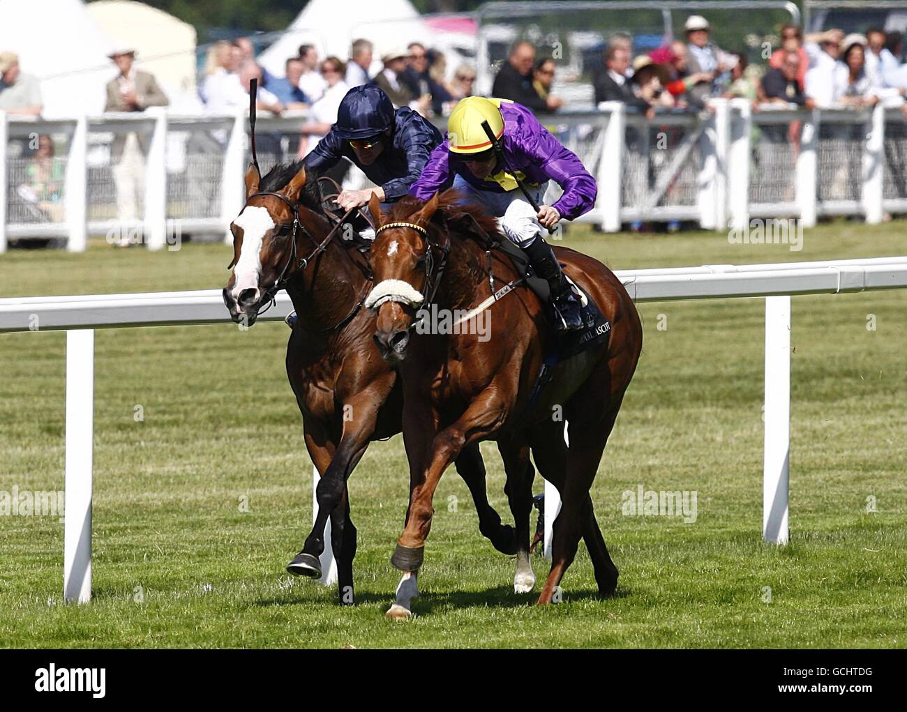 Rite of Passage ridden by Pat Smullen (right) wins the Gold Cup from Age of Aquarius ridden by Johnny Murtagh during Ladies day at Royal Ascot Stock Photo