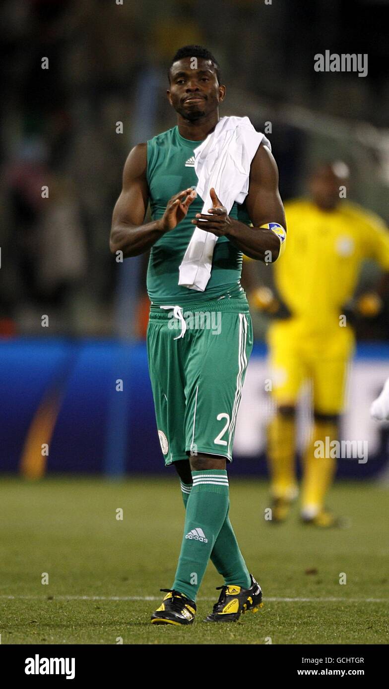 Nigeria's Joseph Yobo applauds after the final whistle Stock Photo