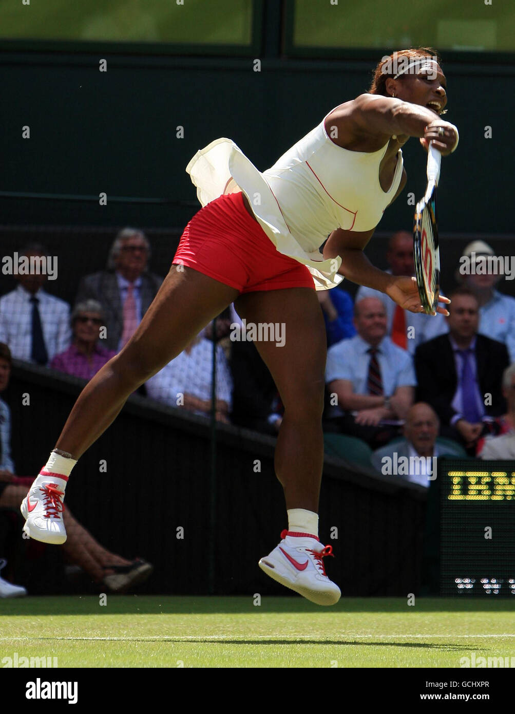 USA's Serena Williams in action against Portugal's Michelle Larcher De Brito during Day Two of the 2010 Wimbledon Championships at the All England Lawn Tennis Club, Wimbledon. Stock Photo