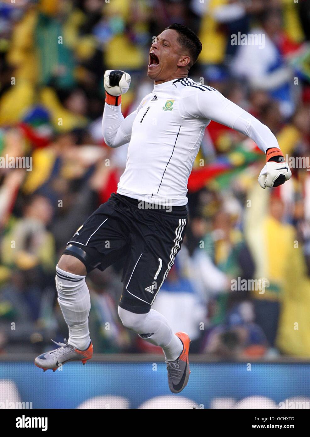 South Africa goalkeeper Moeneeb Josephs celebrates after teammate