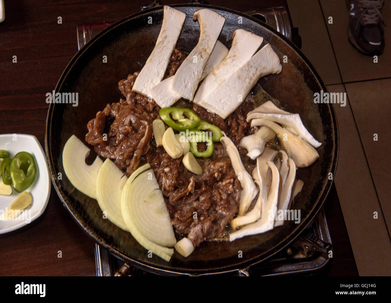 Bulgogi-barbecued beef, Korean  Restaurant Han Mi, Rentzelstr. 36, Hamburg, Germany Stock Photo
