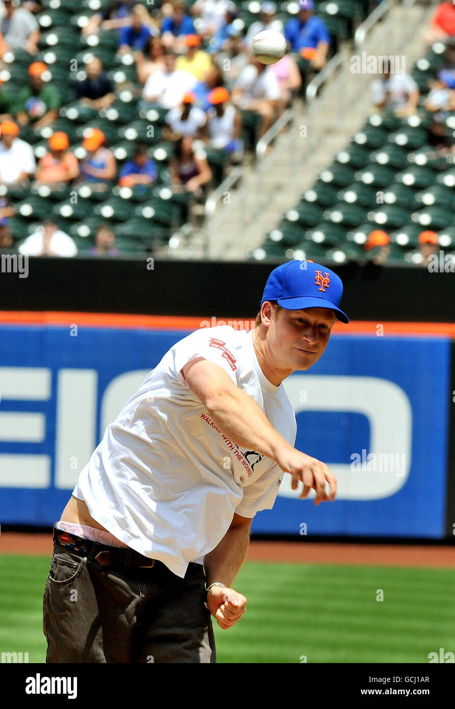 Prince Harry throws a baseball at the New York Mets stadium, ahead of
