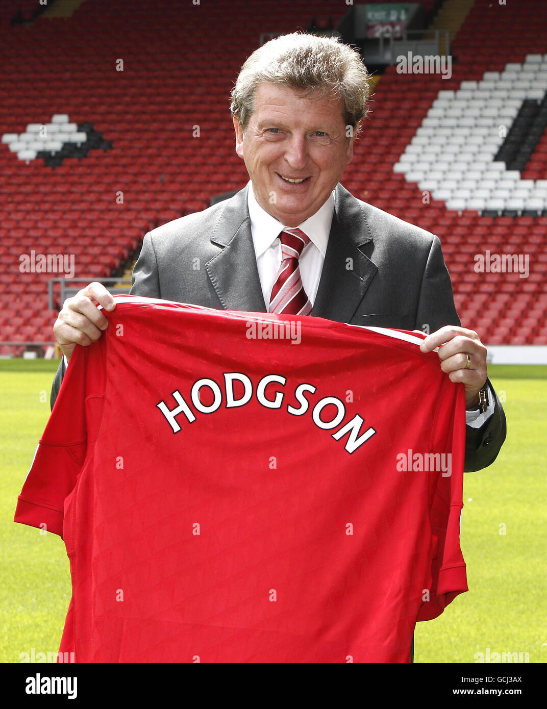 Soccer liverpool half length mid eye contact smiling mangis