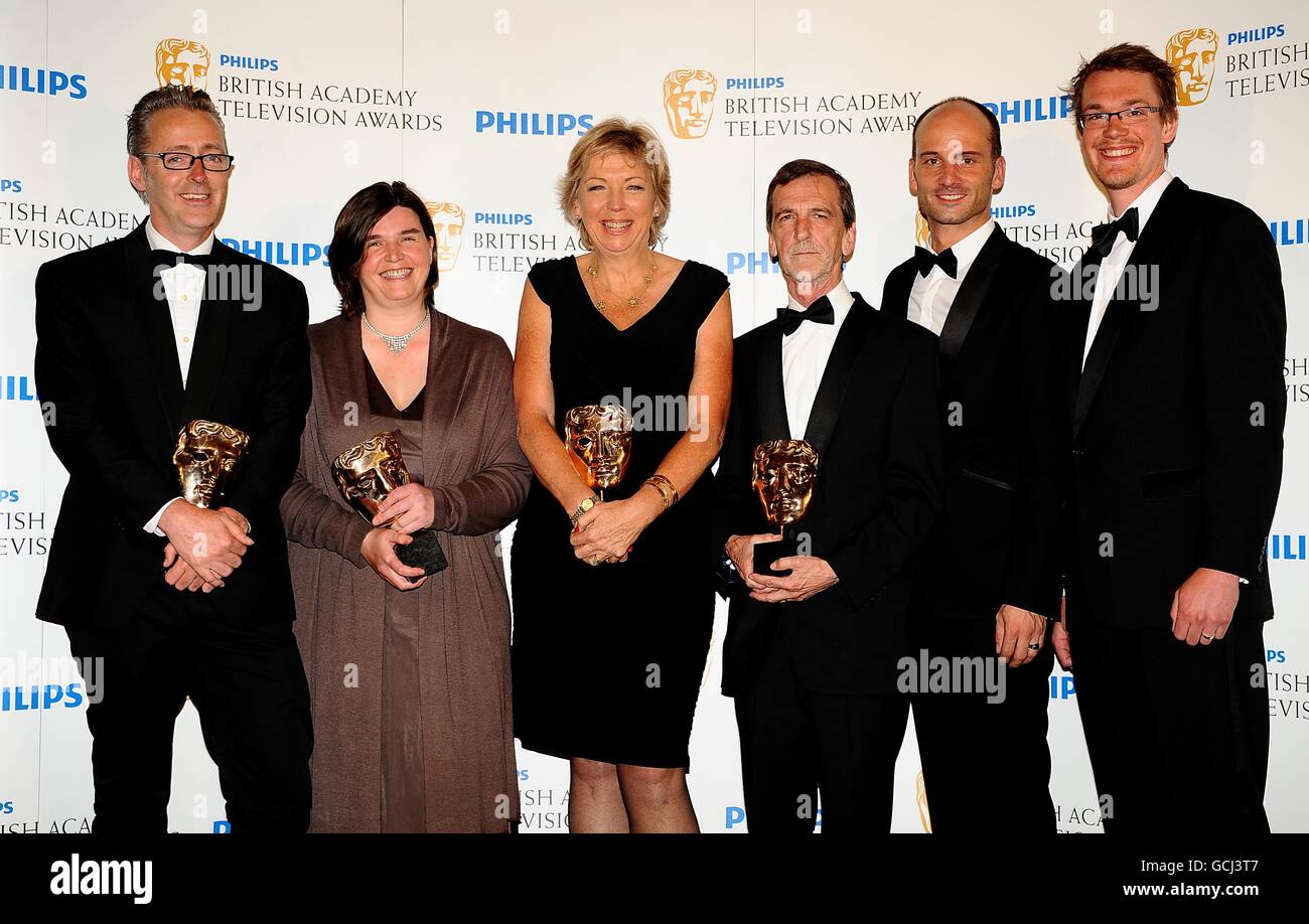 (left to right) Gwyn Jones, Sara Hardy, Jane Aldus, Roger Courtiour, Max Brunold and Stuart Bernard with the Single Documentary award received for Wounded at the BAFTA television awards at the London Palladium. Stock Photo