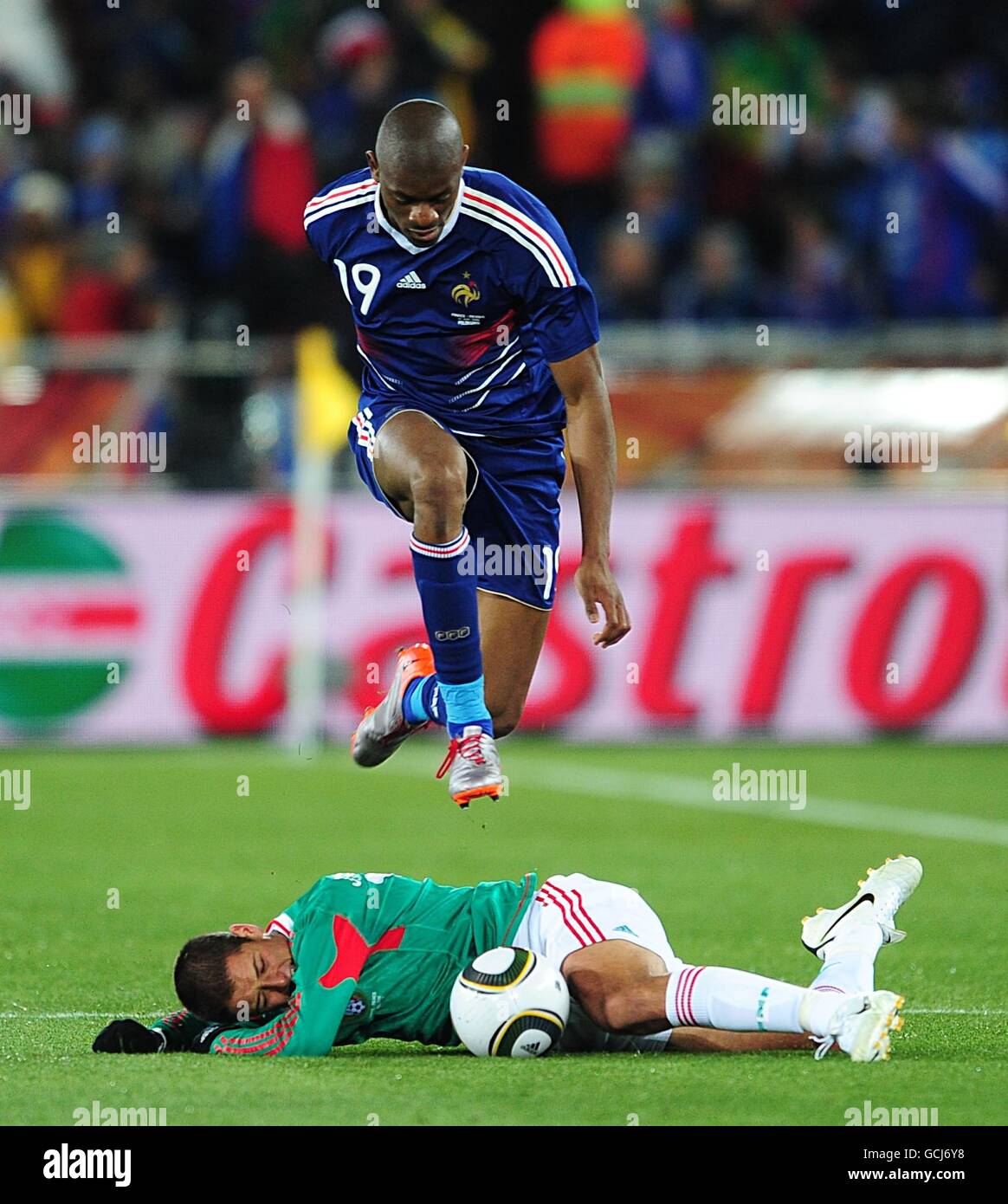 France's Vassiriki Diaby jumps over Mexico's Javier Hernandez after battling him to the ball. Stock Photo