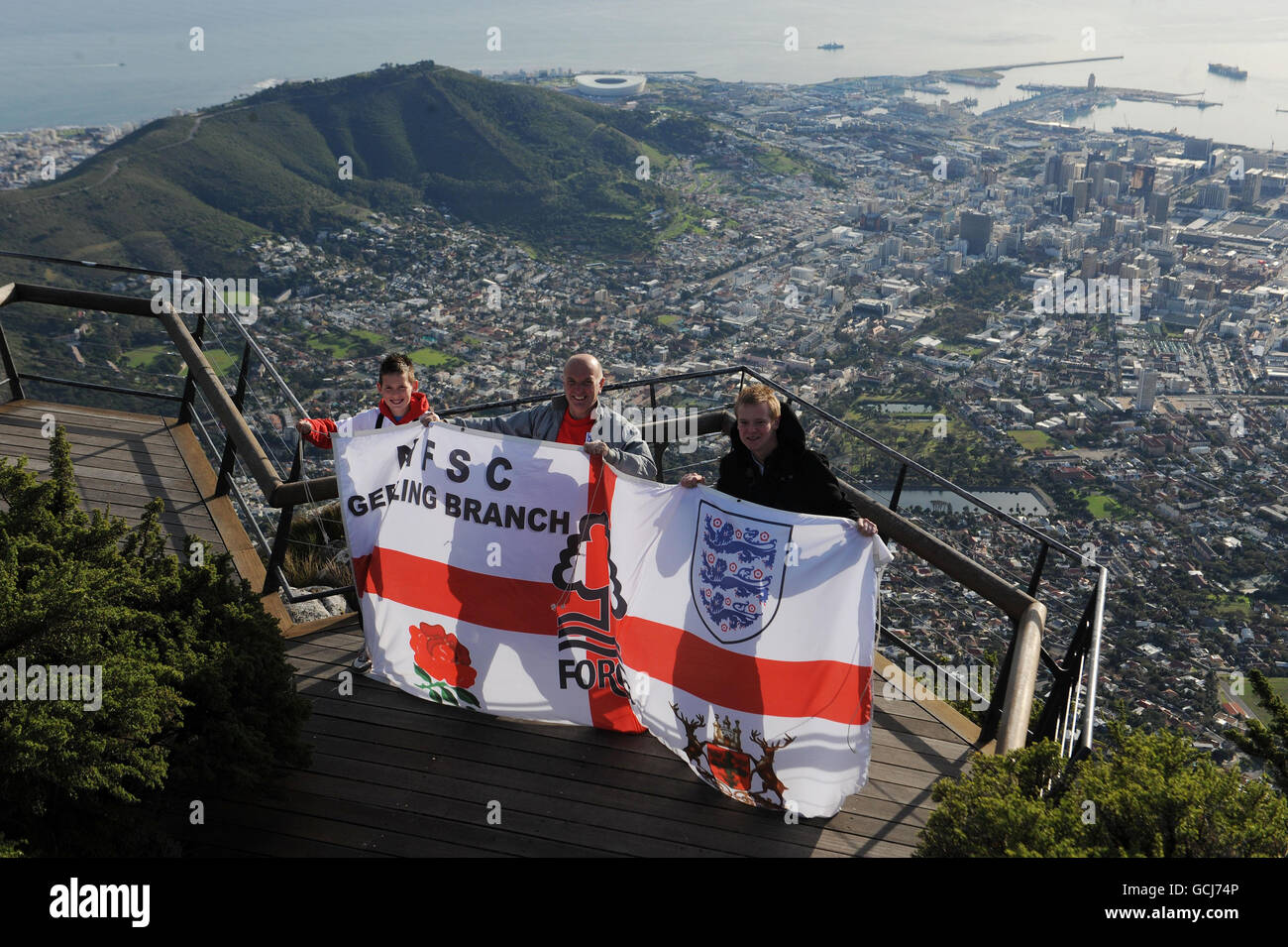 England fans soak up the atmosphere at the top Of Table Mountain in Cape Town, South Africa. Stock Photo