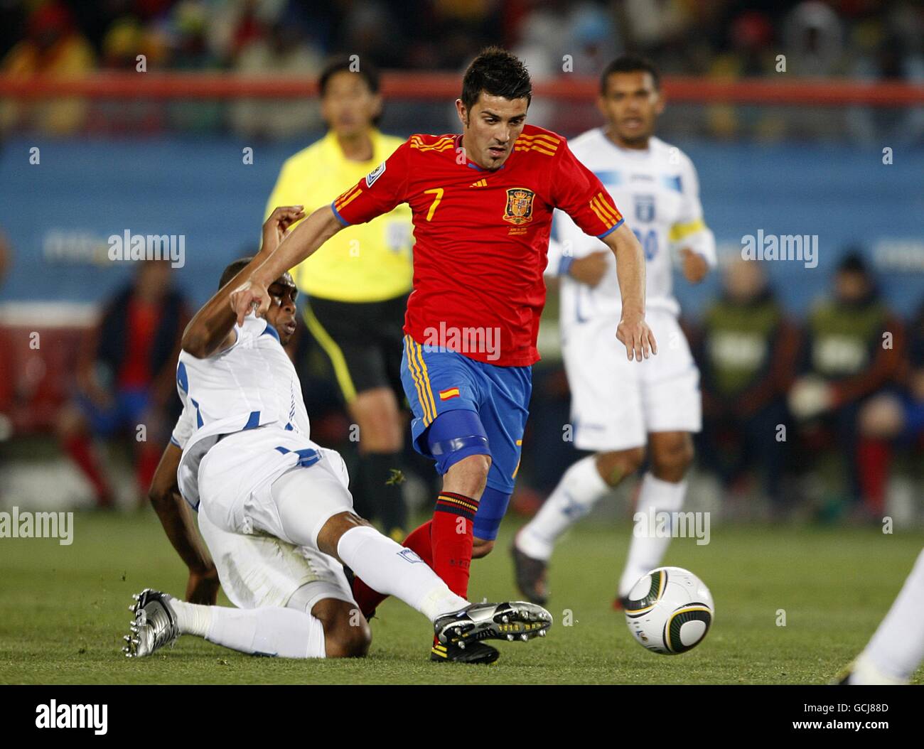 Spain's David Villa (right) and Honduras' Wilson Palacios battle for the ball Stock Photo