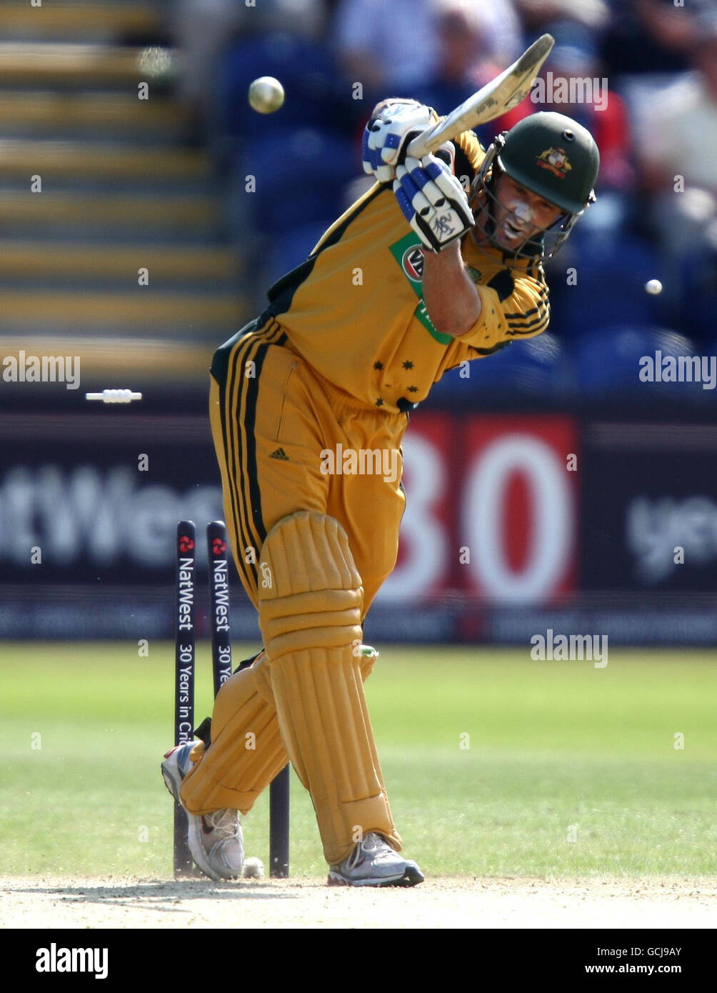 Australia's Michael Hussey is bowled by James Anderson for 14 during the Second One Day International at the SWALEC Stadium, Cardiff, Wales. Stock Photo