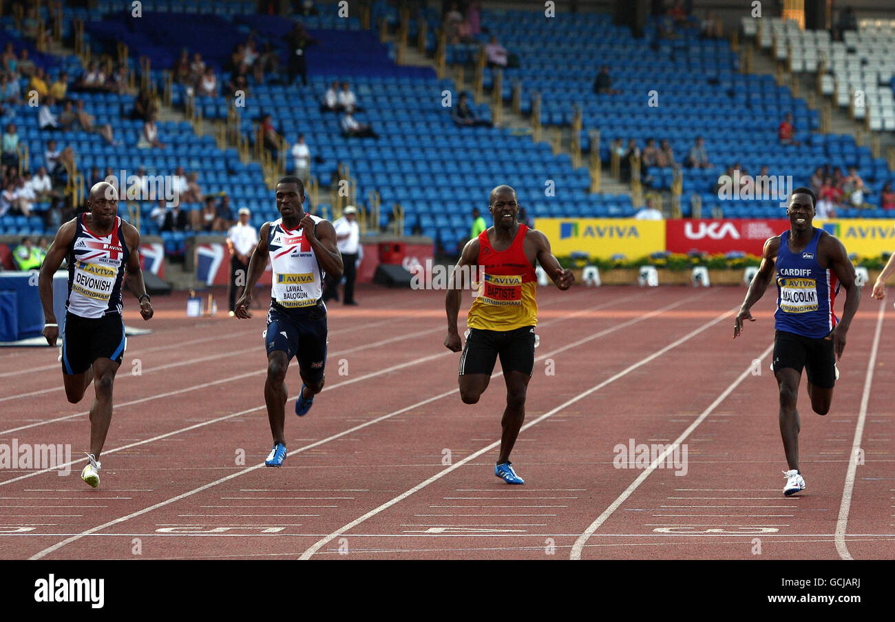 Christian Malcolm (right in Blue) wins the Men's 200m Final from Marlon Devonish (far left) during the Aviva European Trials and UK Championships at the Alexander Stadium, Birmingham. Stock Photo