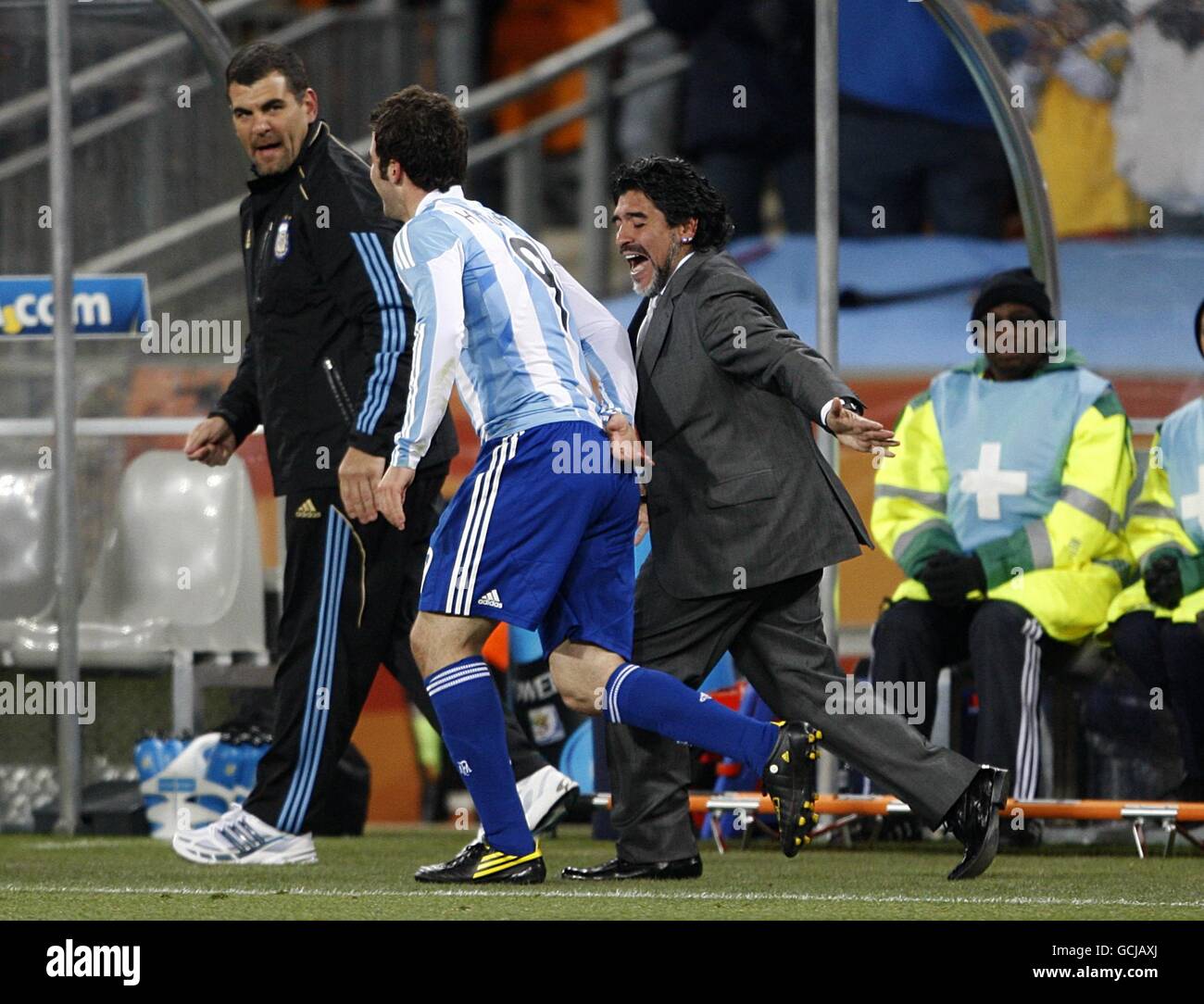 Argentina coach Diego Maradona celebrates his sides second goal scored by Gonzalo Higuain (left) Stock Photo