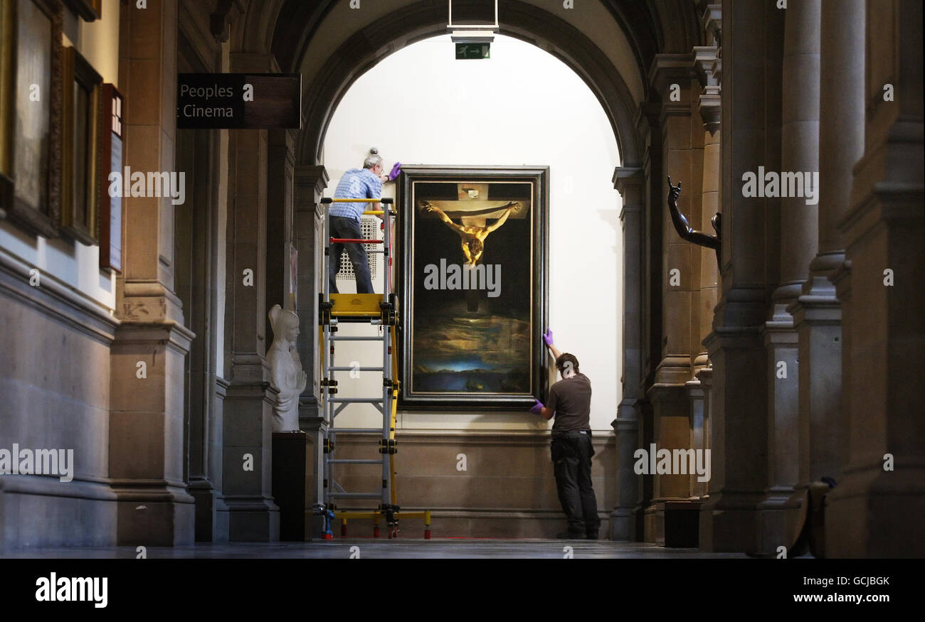 The Christ of St John of the Cross, a painting by Salvador Dali, is removed from display at the Kelvingrove Art Gallery and Museum in Glasgow, in preparation of its display at the Salvador Dali: The Late Work exhibition in Atlanta, USA. Stock Photo