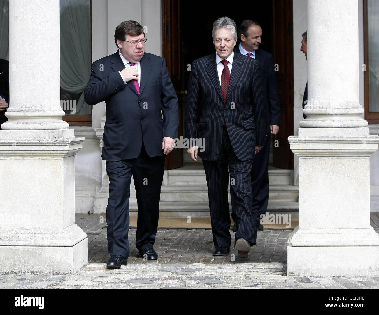 Taoiseach Brian Cowen (left) greets Northern Ireland First Minister Peter Robinson at the 10th plenary meeting of the North-South ministerial council at Farmleigh house in Dublin. Stock Photo
