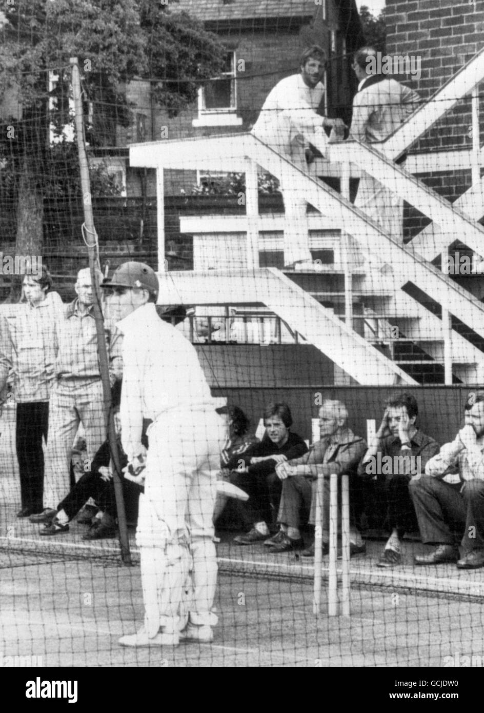 Mike Brearley England's new captain practices in the nets while former skipper Ian Botham chats to a friend in the background. Stock Photo