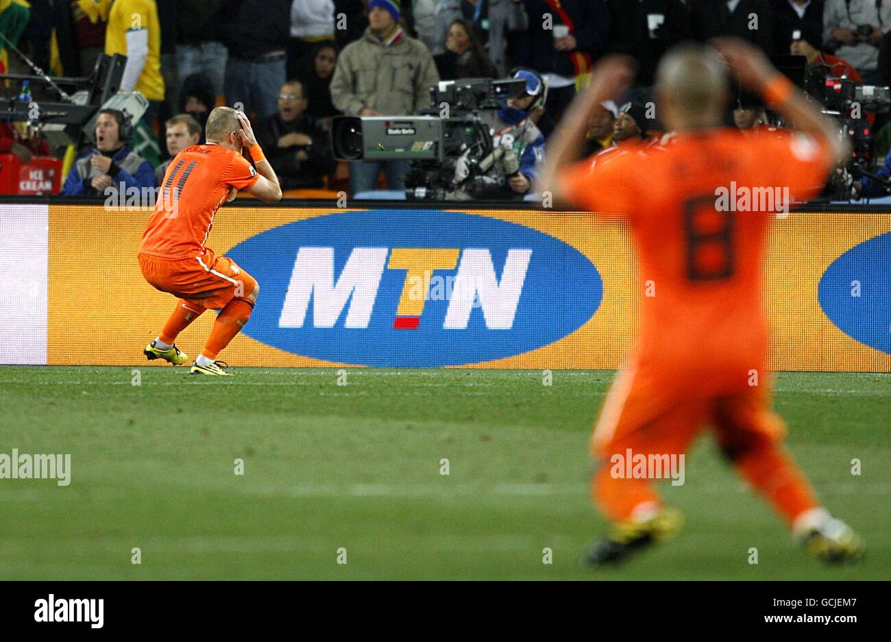 Netherlands' Arjen Robben (left) and Nigel De Jong (right) dejected after a missed chance on goal Stock Photo