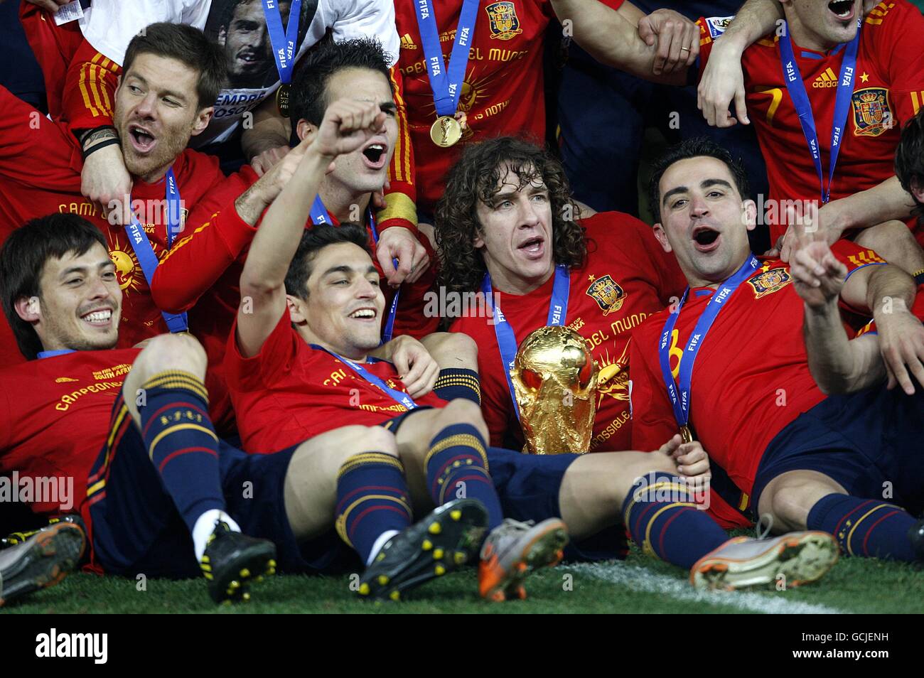(left to right) Spain's David Silva, Xabi Alonso, Gonzalez Jesus Navas, Francesc Fabregas, Carles Puyol and Hernandez Xavi celebrate victory with the world cup trophy Stock Photo