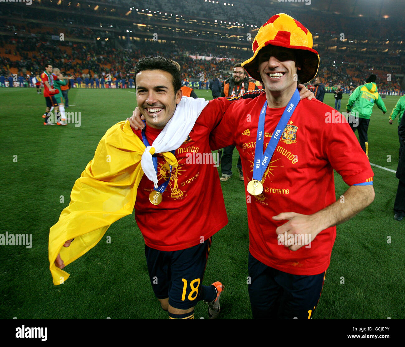 Spain's Pedro and Alvaro Arbeloa celebrate with after winning against Netherlands Stock Photo