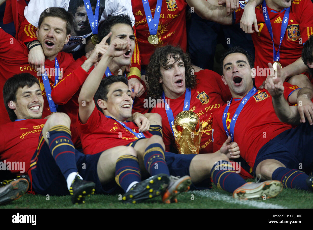 (left to right) Spain's David Silva, Xabi Alonso, Gonzalez Jesus Navas, Francesc Fabregas, Carles Puyol and Hernandez Xavi celebrate victory with the world cup trophy Stock Photo