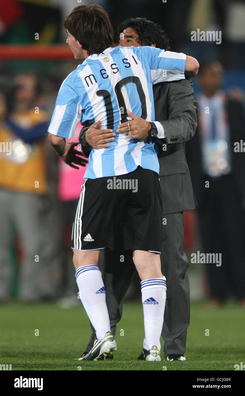 Former Argentina's soccer star Diego Maradona, left, shields the