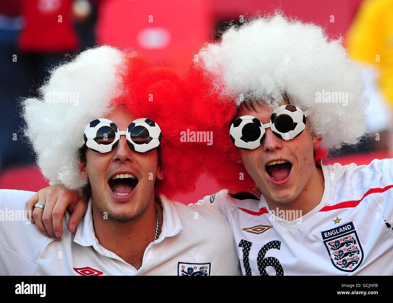 Soccer - 2010 FIFA World Cup South Africa - Group C - Slovenia v England - Nelson Mandela Bay Stadium. England fans in the stands prior to kick off Stock Photo