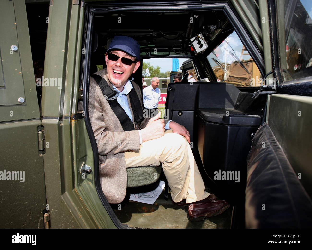 Peter Luff, Minister for Defence Equipment, Support and Technology, sits in a Panther vehicle during Defence Vehicle Dynamic (DVD) 2010, a showcase of military equipment at the Millbrook Proving Ground in Bedfordshire. Stock Photo