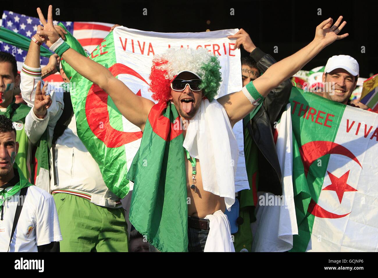 Soccer - 2010 FIFA World Cup South Africa - Group C - USA v Algeria - Loftus Versfeld Stadium. Algerian fans show their support in the stands prior to kick off Stock Photo