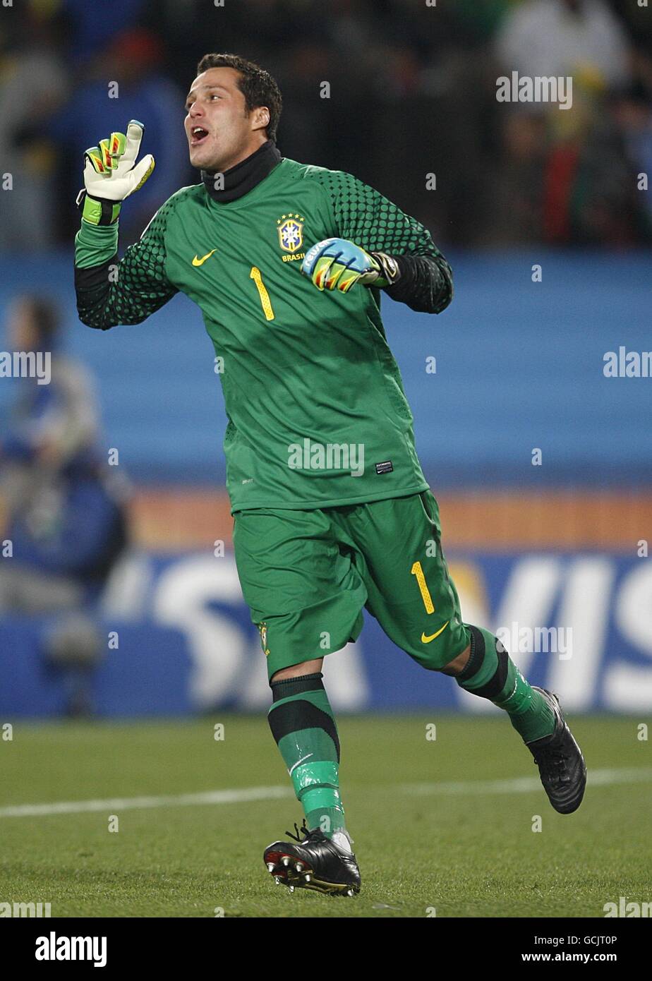 Soccer - 2010 FIFA World Cup South Africa - Round Of 16 - Brazil v Chile - Ellis Park. Brazil's goalkeeper Soares Julio Cesar celebrates after his team mate Silveira Juan scored the opening goal. Stock Photo