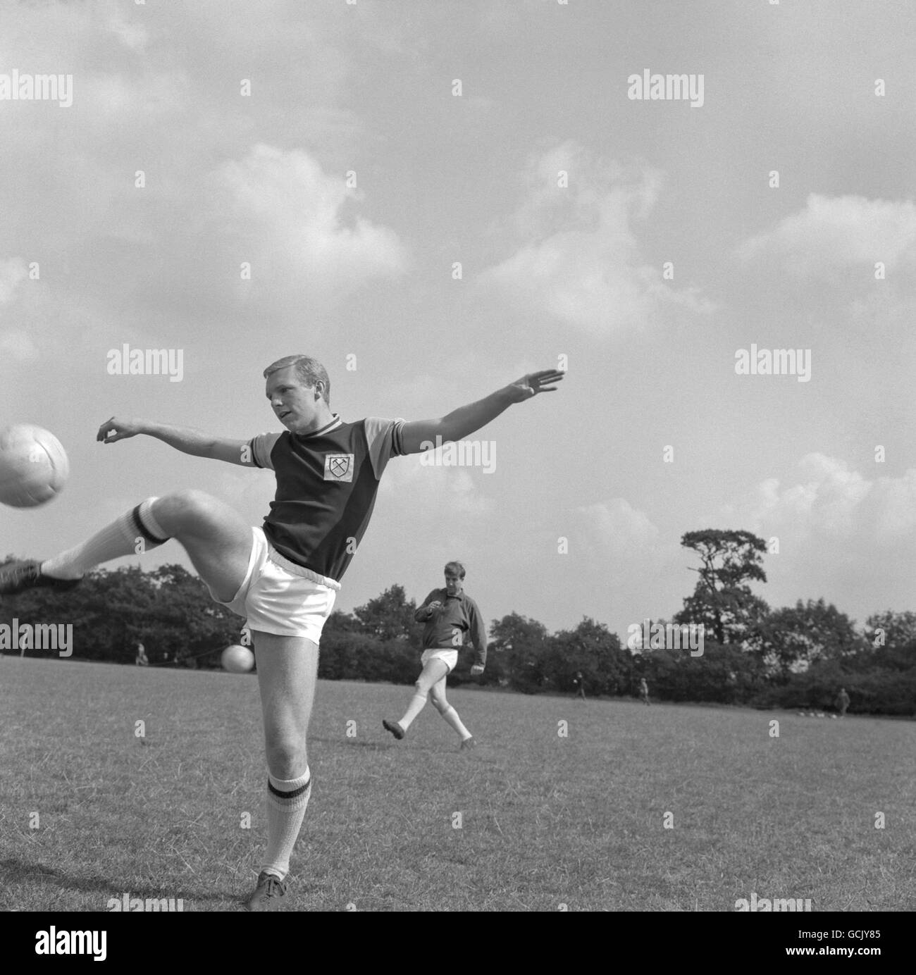 Soccer - League Division One - West Ham United Pre-Season Training - Grange Farm. Bobby Moore juggles the ball as he trains wit other West Ham United players at Grange Farm, Chigwell, for the new soccer season. Stock Photo