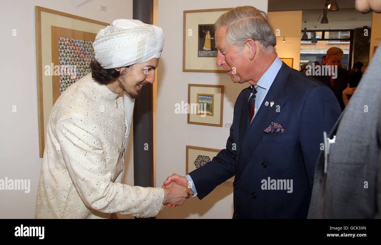 The Prince of Wales meets Waleed Zaman as he attends the annual degree show of his School of Traditional Arts, at the Prince's School of Traditional Arts, east London. Stock Photo