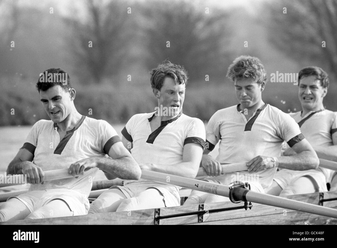 Eton trio C.M Davis, left, P.C.D Burnell, centre, and Tobias William Tennant, second right, during an Oxford practice on the tideway in preparation for the inter-Varsity boat race. Stock Photo