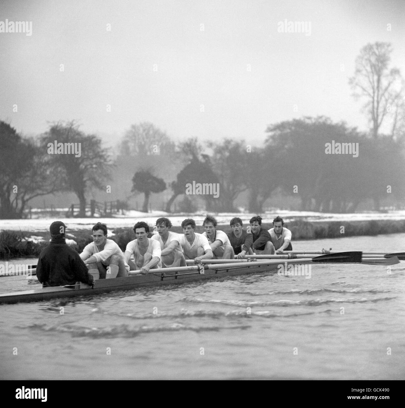 The Oxford crew training on the Thames near Henley, left to right; N. Tonkin, cox, D.C Spencer, stroke, J. Leight-Wood, D.G Bray, R.C.T Mead, Tobias William Tennant, R.A Morton-Maskell, D.D.s Scailes, and N.D Tinne. Stock Photo