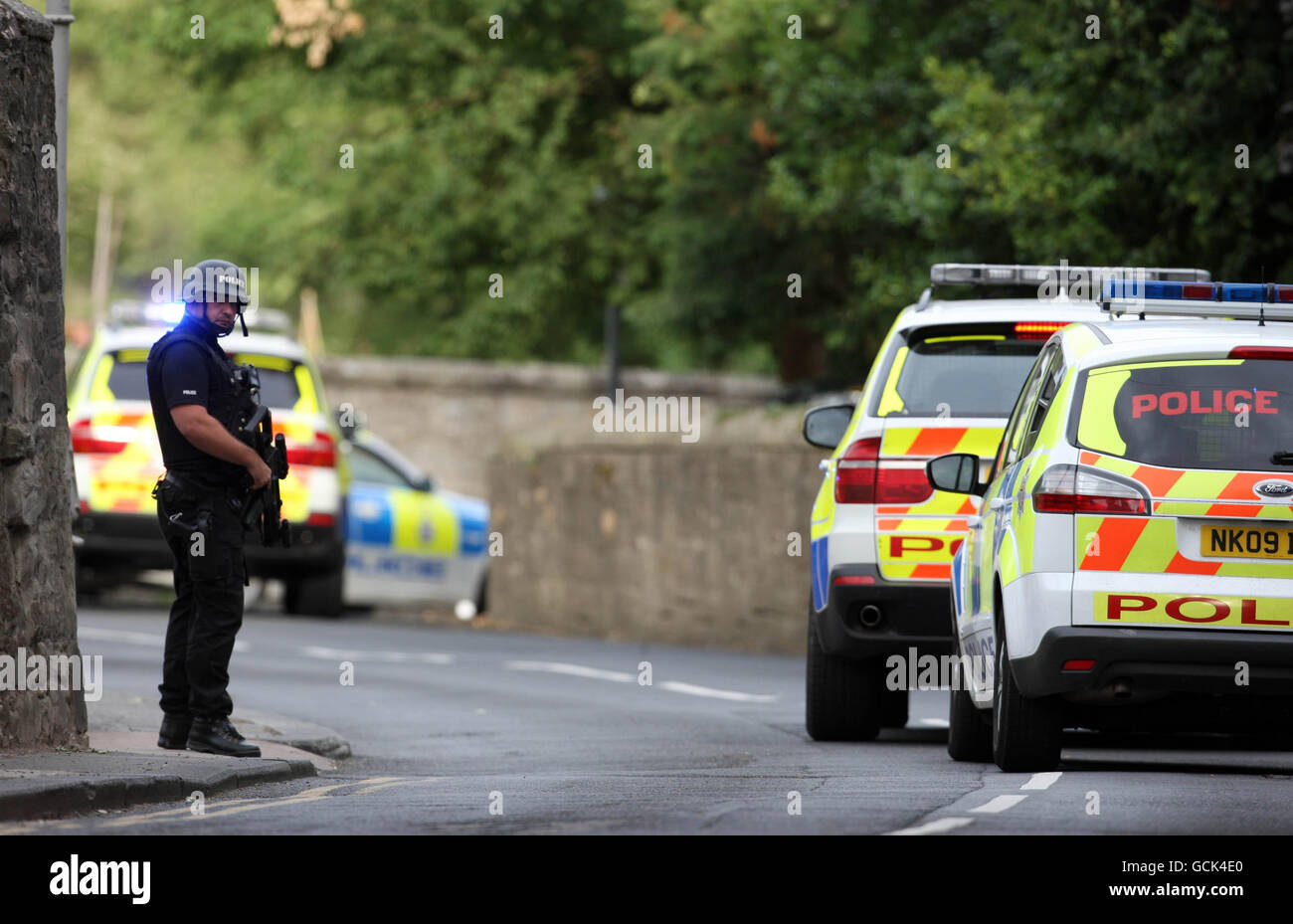 Police officers and vehicles in Rothbury, Northumberland as a major