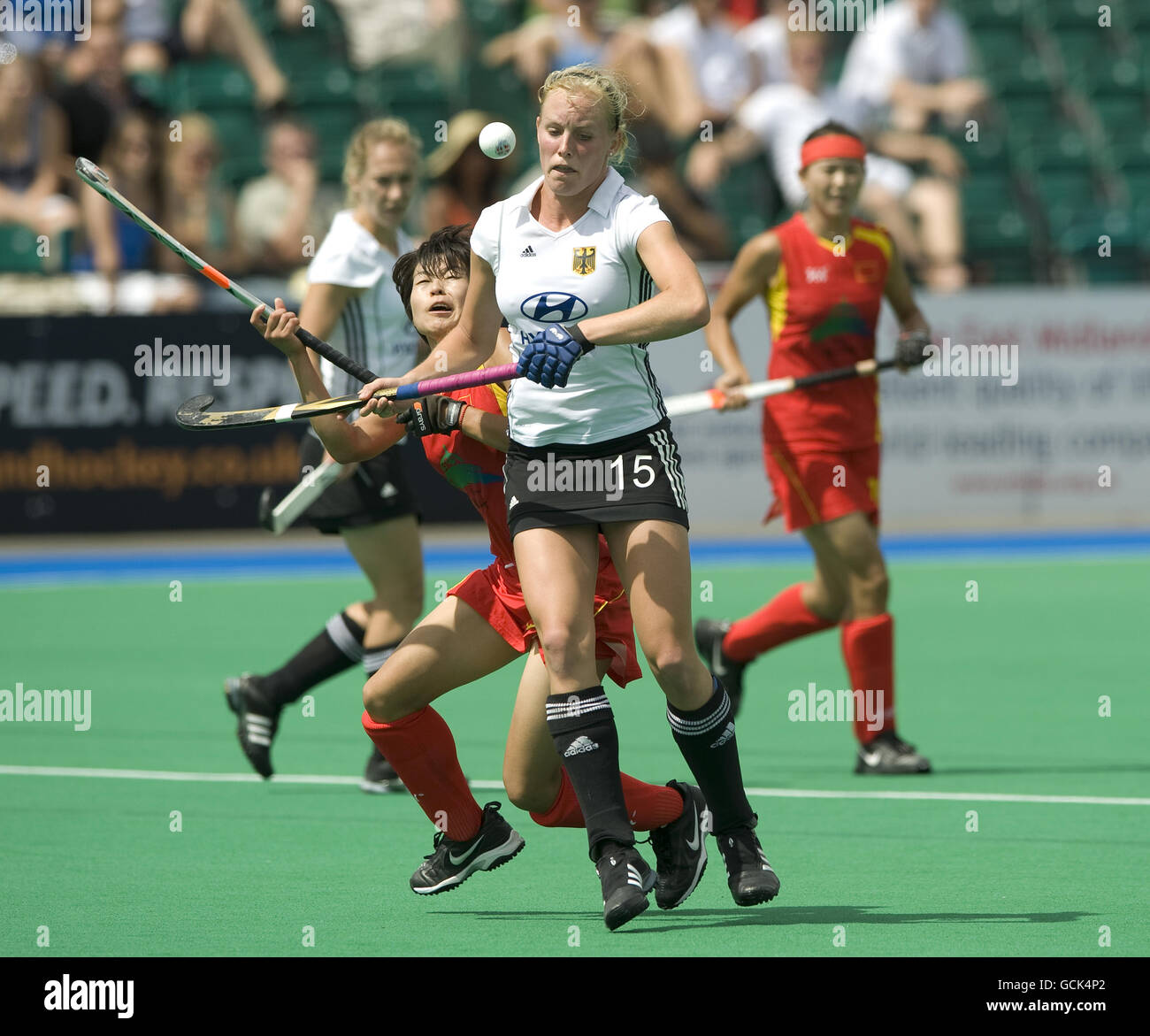 Germany's Hannah Kruger (front) challenges with China's Xiaoxu Xu ...