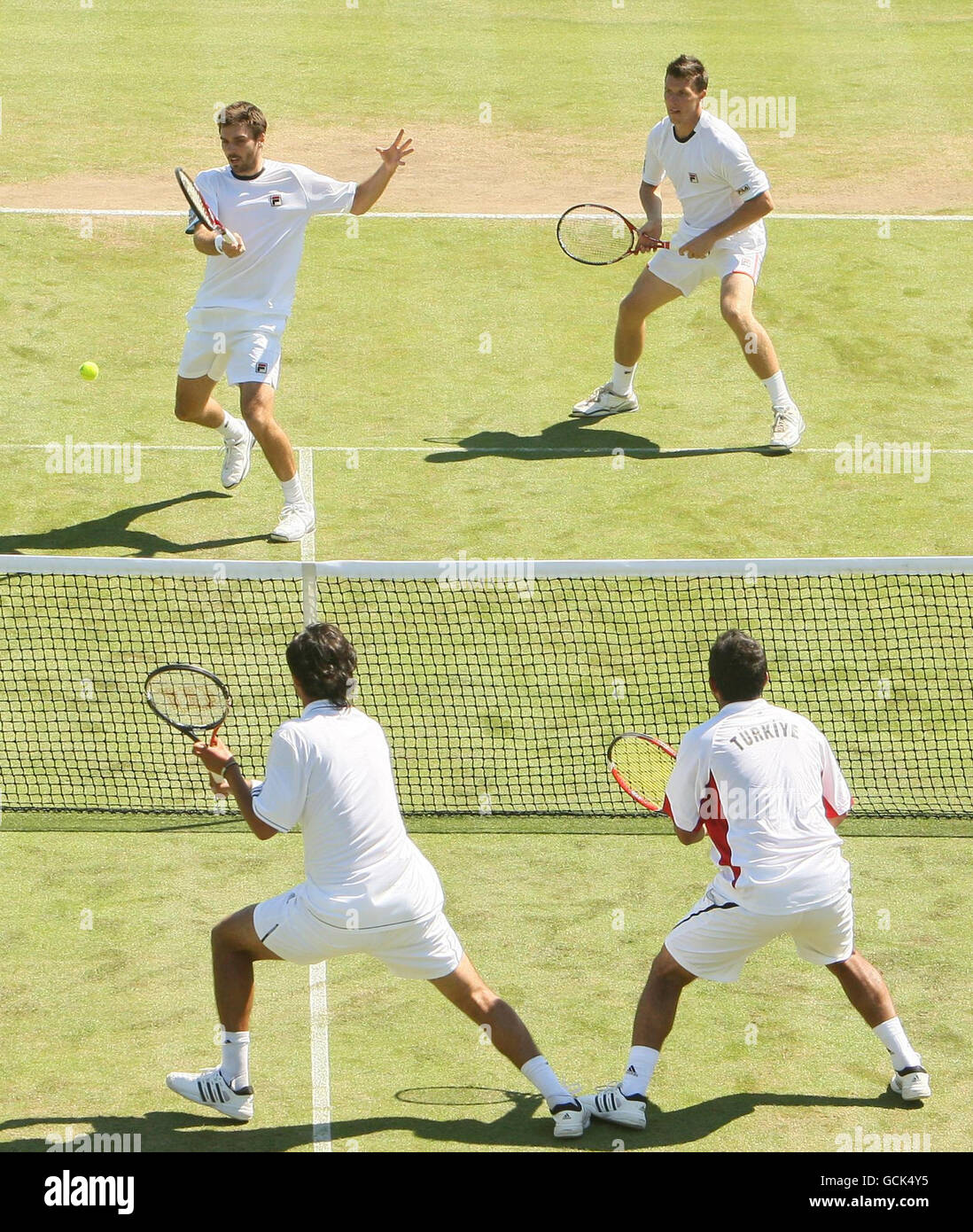 Great Britain's Colin Fleming (top left) and Ken Skupski in action in ...